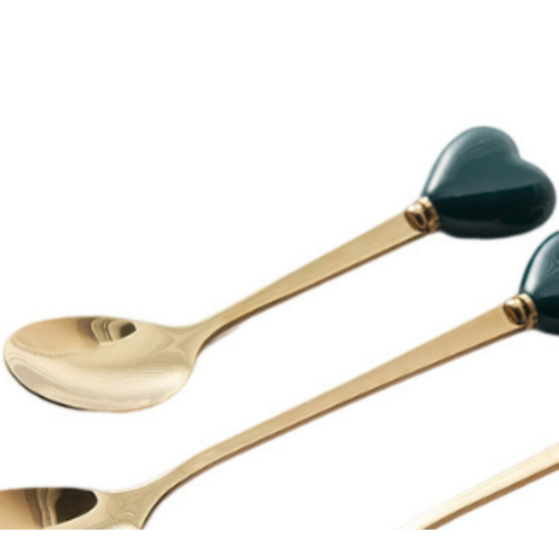 Vaisselle à dessert créative avec poignées en céramique, design exquis et magnifique, ensemble pratique de cuillère à café et de fourchette à fruits.