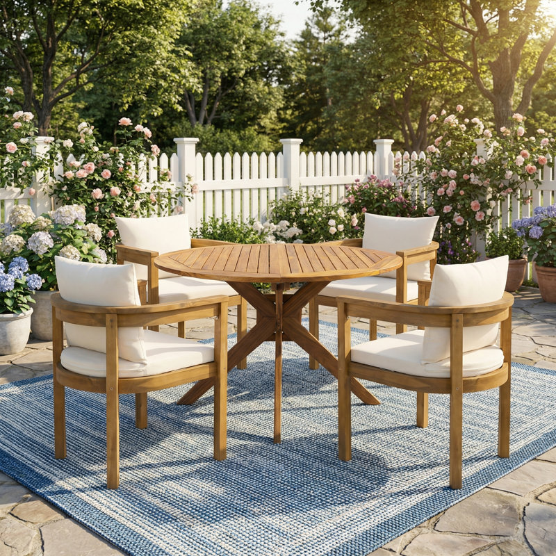 Ensemble repas d'extérieur en bois d'acacia de style bord de mer avec fauteuils rembourrés et table à lattes ronde Renaud