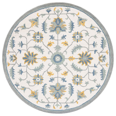 Metro Hand Tufted Wool/Cotton Oriental Rug in Green/Ivory/Blue