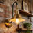 Tevye 1-Light Dimmable Medium Modern Armed Wall Sconce with Copper Finish Shade
