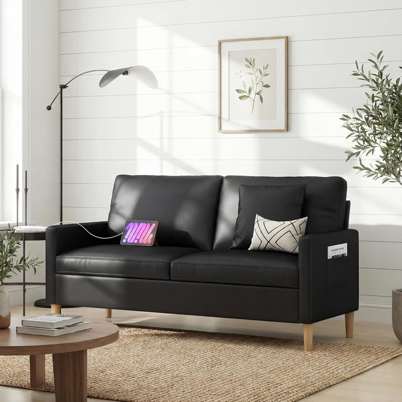 65" Black Faux Leather Sofa