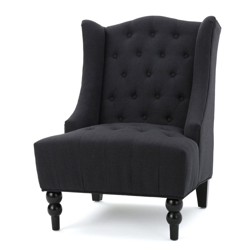 Fauteuil club Tesy, design à oreilles, tissu gris capitonné