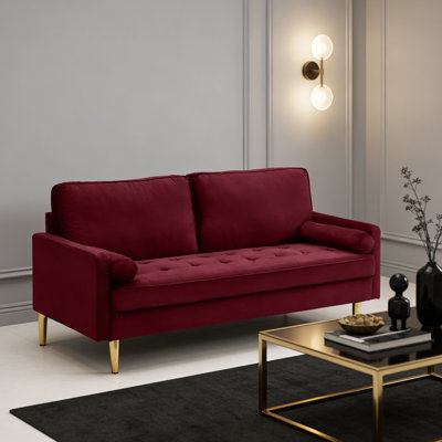 Canapé en velours de style rétro avec pieds et coussins en métal pour le salon ou la chambre à coucher.