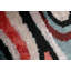 Coussin en velours abstrait