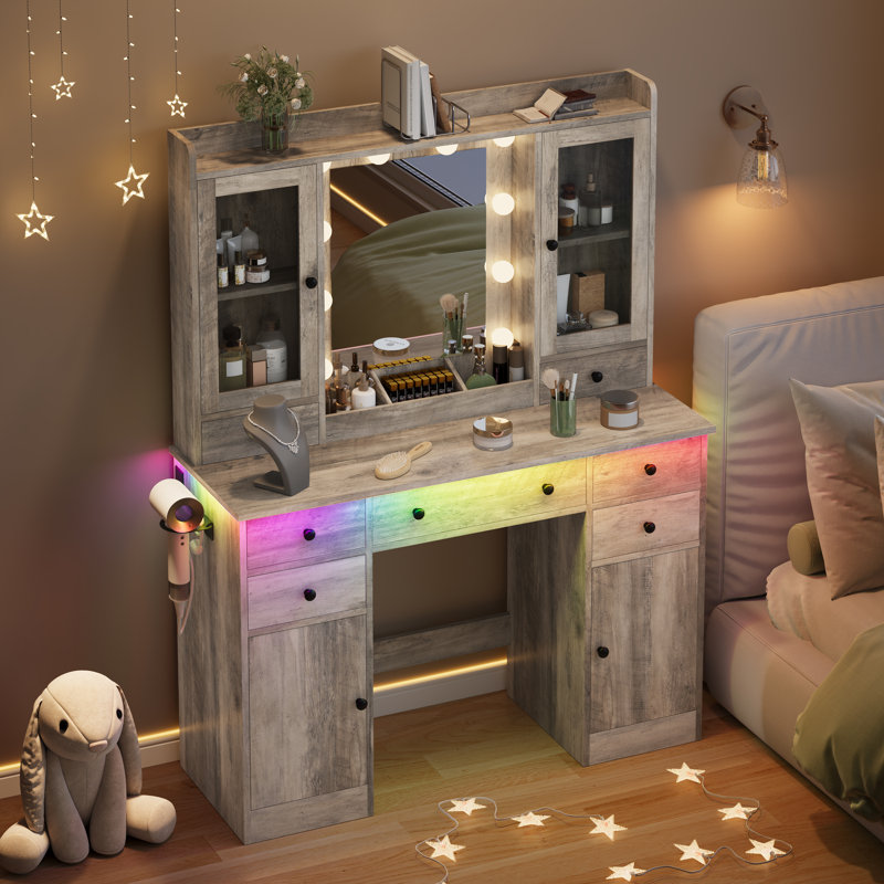 Coiffeuse de maquillage avec lumières DEL et prise de courant, coiffeuse 43,7 po avec 7 tiroirs, armoire de rangement et lumières RVB réglables