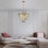 Lustre en cristal de luxe à niveaux, luminaire suspendu avec cadre, éclairage de plafond élégant pour le salon, la salle à manger et la chambre à coucher