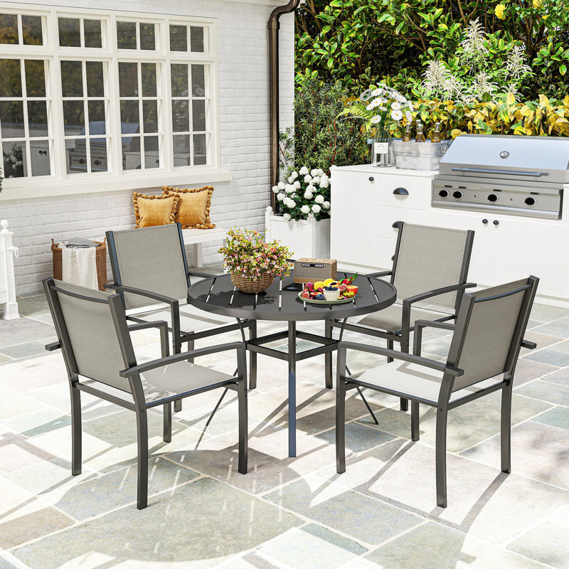 Ensemble repas 5 pièces avec table ronde et 4 chaises empilables