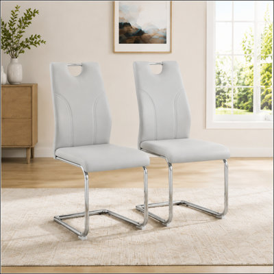 Modern Faux Leather Dining Chairs Set of 2, Mid-Century Cantilever Design with Handle, Ergonomic High Back, Chrome Metal Base, 350lbs Capacity, Grey