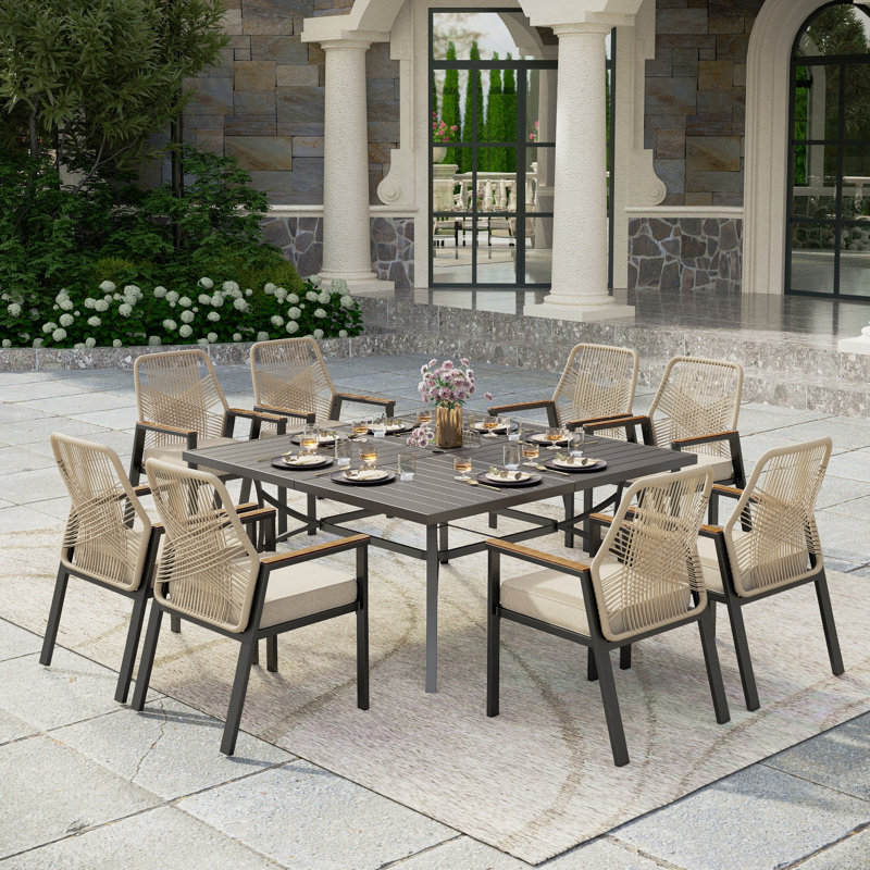 Kerrie 8 - Person Square Outdoor Patio Dining Set With 8 Rattan Chairs & Cushions, Black