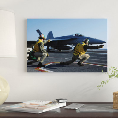 " Shooters Aboard The USS George HW Bush Give The Go-Ahead Signal To Launch An F/A-18 Super Hornet " by Stocktrek Images