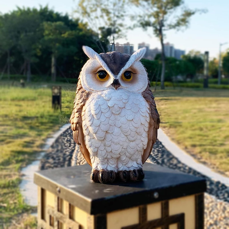 Statue de jardin hibou