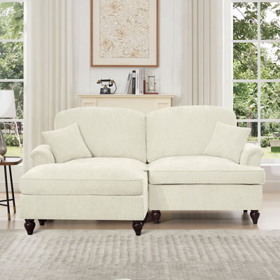 Grand canapé modulaire en L à deux places avec accoudoirs évasés et volants amovibles, jupes plissées et pieds fuselés, canapé-lit en chenille confortable avec repose-pieds mobile