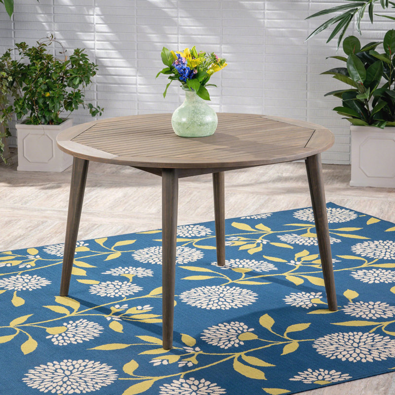 Table de salle à manger robuste en bois d'acacia avec finition résistante à l'eau pour une utilisation durable et une esthétique moderne