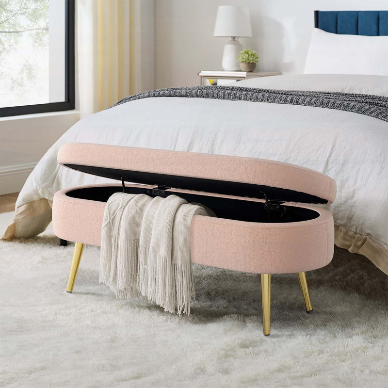 Banc de rangement repose-pieds ovale avec revêtement en flanelle et pieds en métal robustes, parfait pour les espaces de vie modernes et confortables