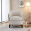 Fauteuil demi-tonneau rembourré à rayures