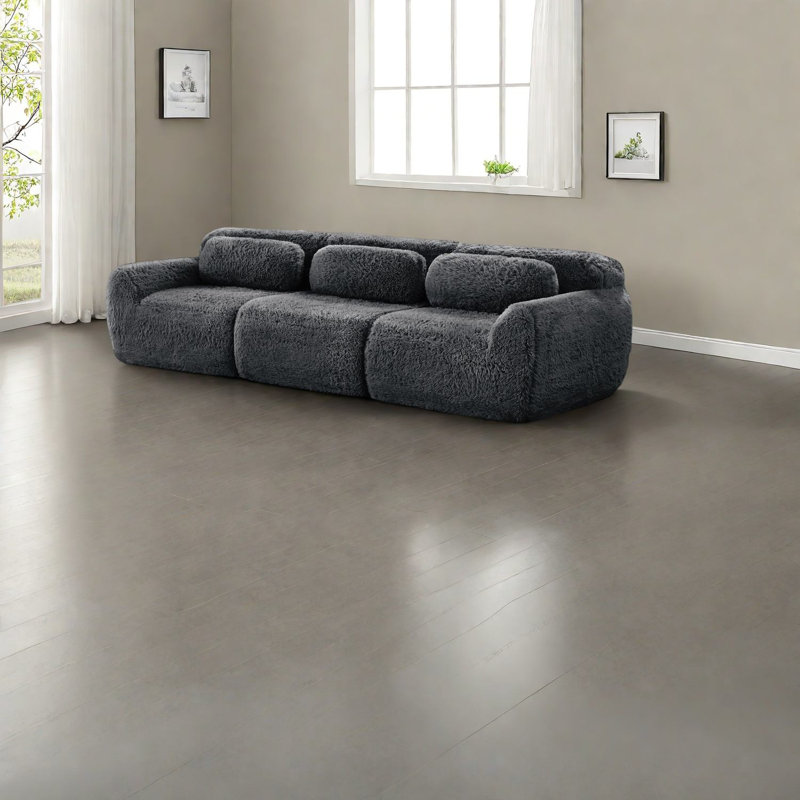 Canapés modulaires spacieux et moelleux, conception ergonomique avec repose-pieds, idéal pour le cinéma maison