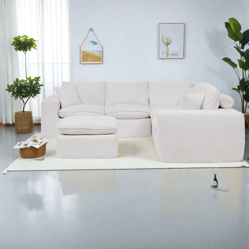 Canapé modulaire spacieux avec repose-pieds Boucle