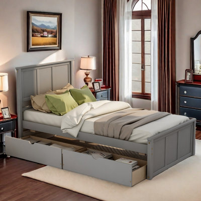 Lit plateforme en bois avec deux tiroirs sous le lit