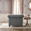Fauteuil club capitonné d'inspiration Chesterfield avec accoudoirs
