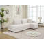 Canapé d'angle capitonné en forme de L d'inspiration scandinave avec coussins décoratifs