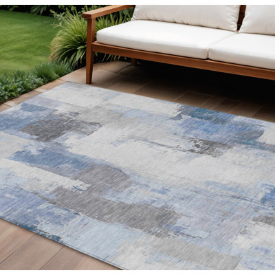 Tapis extérieur lavable abstrait bleu et ivoire 8 pi x 10 pi Denim