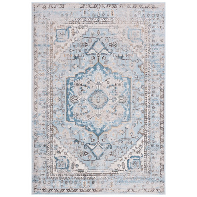 Tapis oriental bleu en polypropylène tissé à la machine McLeansville