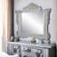 Miroir arqué en platine antique