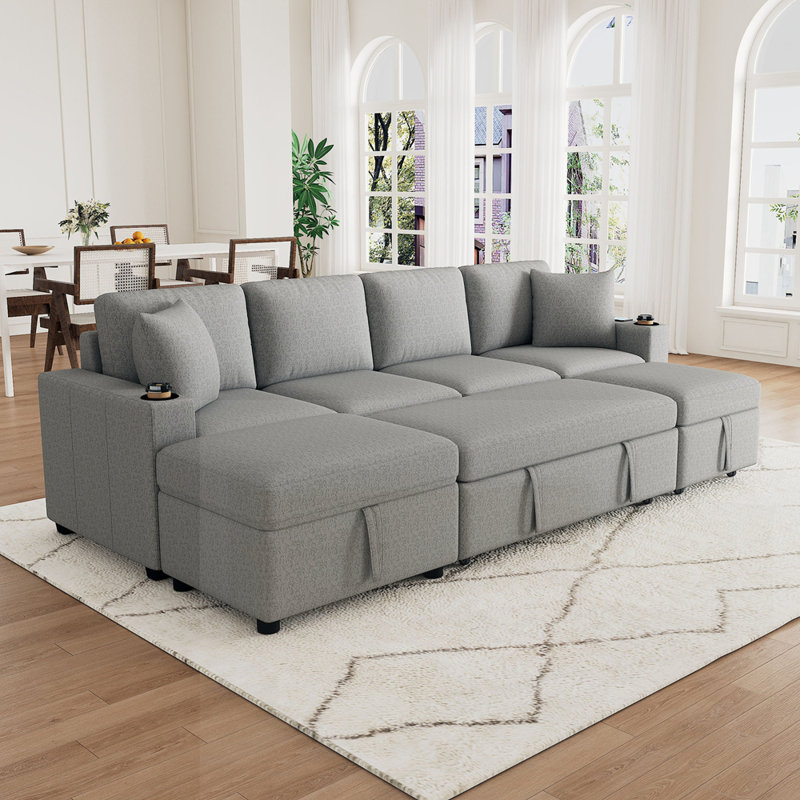 Canapé modulaire convertible avec lit escamotable et repose-pieds de rangement mobile, parfait pour la vie moderne et polyvalente.