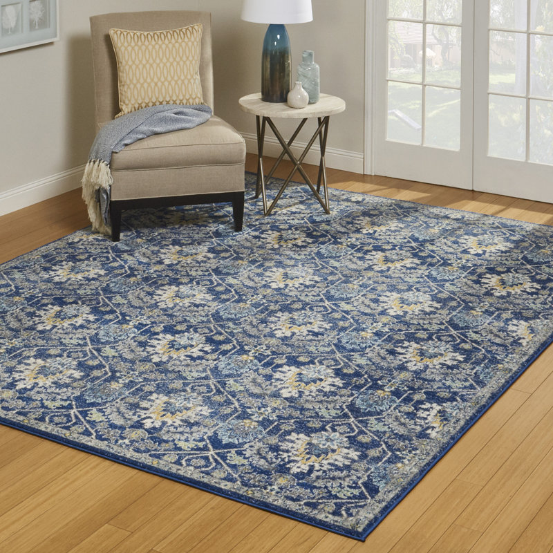 Blue and Ivory Geometric Synthetic 8' x 10' Area Rug