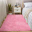 Tapis rose tissé à la main-586259772
