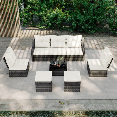 Louann Five-person Group Outdoor Wicker Set With Wicker Coffee Table And Two Ottomans