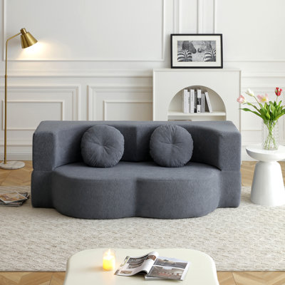 2-in-1 Folding Sofa Bed with Pillow, Converts Easily from Couch to Twin Sleeper for Space-Saving Comfort.