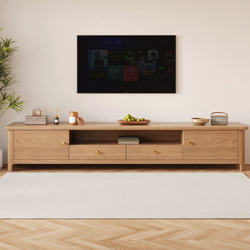 Meuble télé en bois massif aux lignes douces