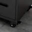 Armoire à outils mobile en acier à quatre tiroirs avec compartiments de rangement verrouillables, idéale pour les ateliers, les maisons et les garages.
