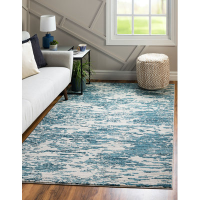 Tapis bleu contemporain Araceli
