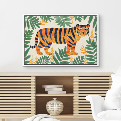 Mignon tigre orange entouré de plantes tropicales, impression sur toile encadrée