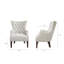 Fauteuil à oreilles capitonné Hannah