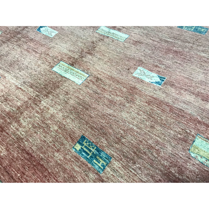 Tapis rose de haute qualité noué à la main