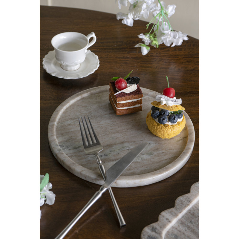 D10 "Plateau rond en marbre avec finition gris naturel