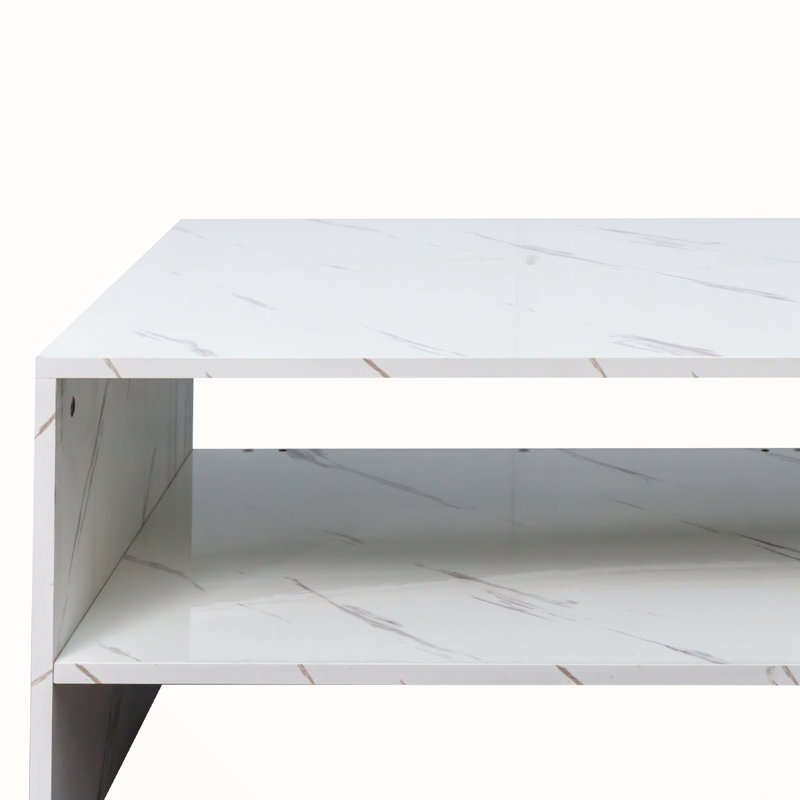 Coffee table with unique architectural shape, White