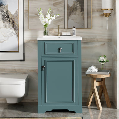 Meuble-lavabo de 20 pouces avec lavabo en céramique, porte à fermeture douce, tablette réglable et support de rangement fixé à la porte - idéal pour les petites salles de bain
