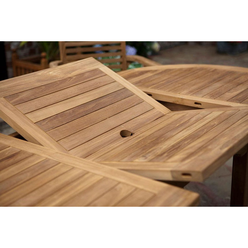 Hartridge 8 - Person Teak Wood Patio Dining Set with Extendable Oval Table , Cushions Included