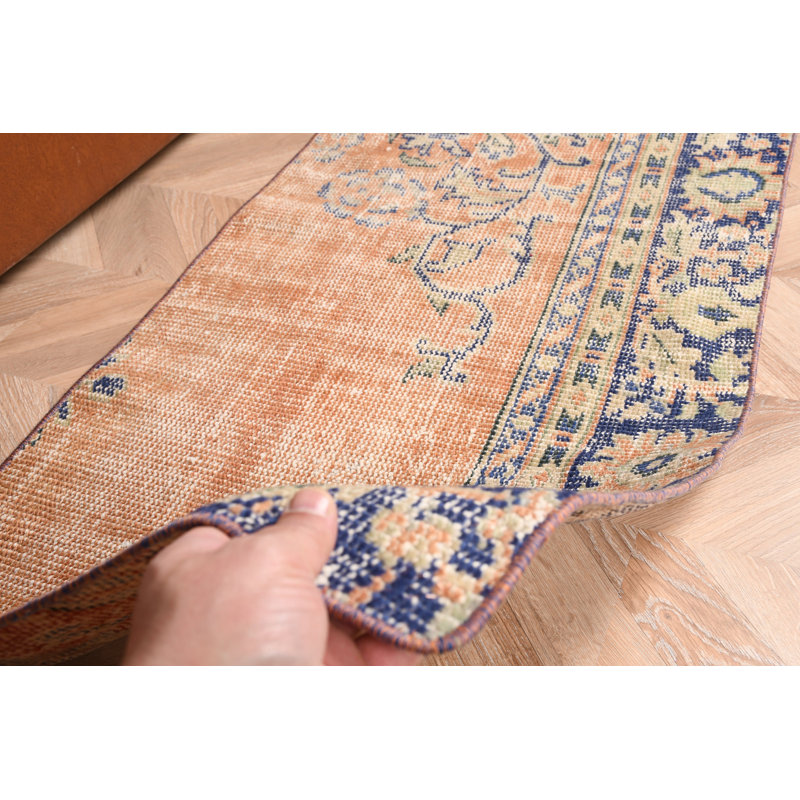 Vintage Turkish Rug in Faded Anatolian Style for Kitchen and Farmhouse Decor with Bohemian Floor Accent in Wool Oushak and Vibrant Orange Door Mat Design