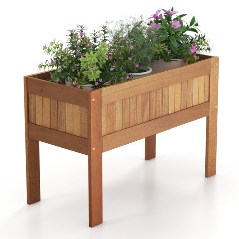 Boîte à fleurs surélevée en bois avec jardin
