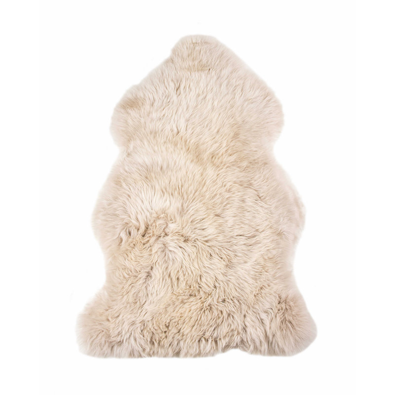 Tapis beige en peau de mouton Ameena