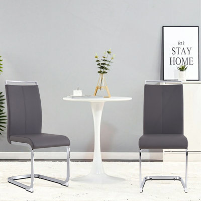 Chaises de salle à manger modernes, chaise d'appoint rembourrée en similicuir à haut dossier avec pieds en métal chromé en forme de C pour la salle à manger