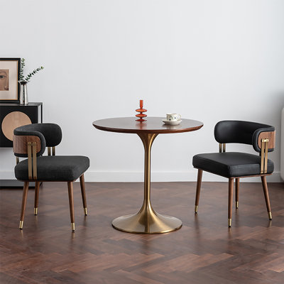 31.5"A round small conference table can accommodate four people.