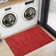 Ellicia Solid Color Polyester Area Rug in Red/Orange