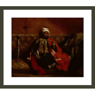 A Turk smoking sitting on a sofa by Eugène Delacroix -Framed Giclee Print