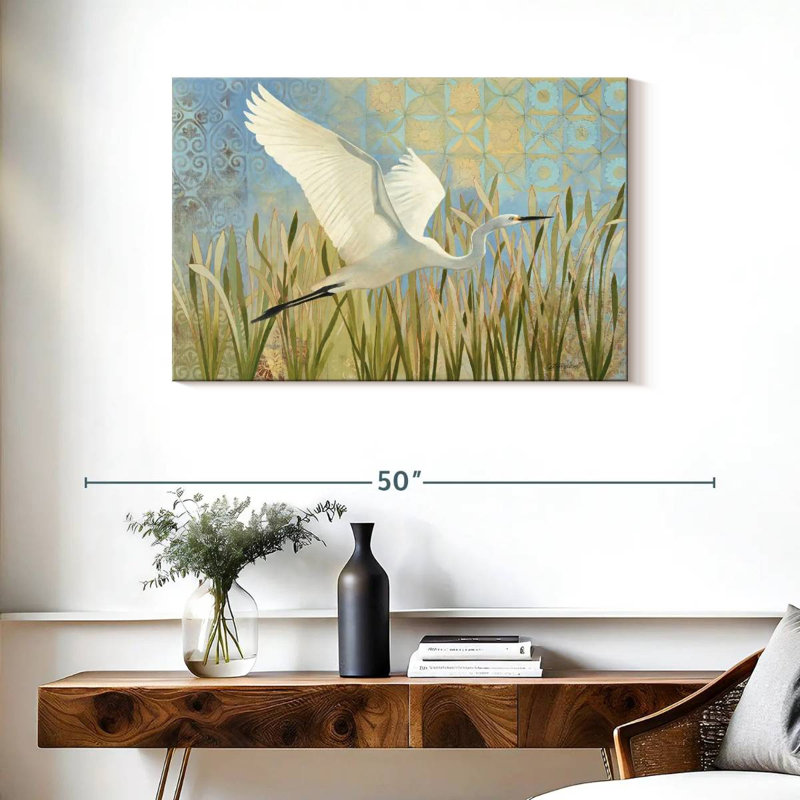 Aigrette enneigée en vol, H 24 po x l 36 po